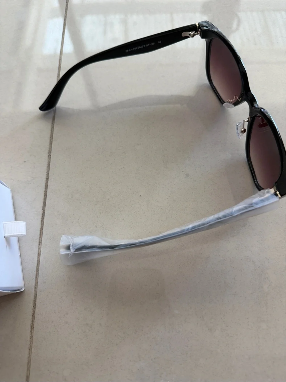Uniqlo Black Frame UV protection Sunglasses with brown lens